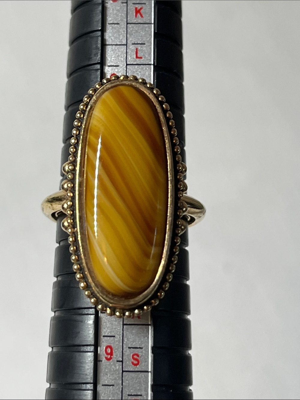 Vintage Avon gold oval ring with adjustable sizing